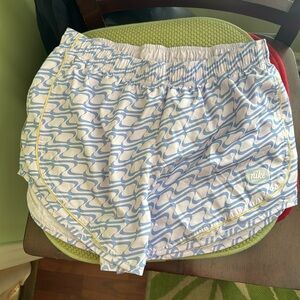 Purple Nike running shorts